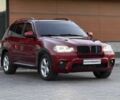 Красный БМВ Х5, объемом двигателя 3 л и пробегом 220 тыс. км за 14000 $, фото 1 на Automoto.ua