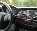 Красный БМВ Х5, объемом двигателя 3 л и пробегом 213 тыс. км за 20900 $, фото 12 на Automoto.ua