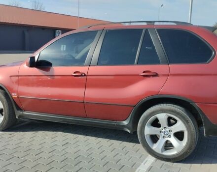 Красный БМВ Х5, объемом двигателя 3 л и пробегом 345 тыс. км за 6500 $, фото 1 на Automoto.ua