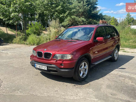 Красный БМВ Х5, объемом двигателя 3 л и пробегом 331 тыс. км за 7600 $, фото 1 на Automoto.ua
