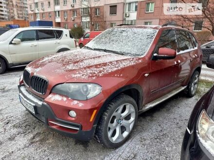 БМВ Х5 2009 у Києві на Automoto.ua Червоний БМВ Х5, об'ємом двигуна 3 л та пробігом 296 тис. км за 12000 $, фото 1 на Automoto.ua
