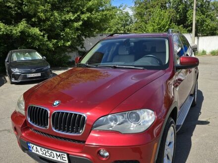 Красный БМВ Х5, объемом двигателя 3 л и пробегом 261 тыс. км за 12000 $, фото 1 на Automoto.ua