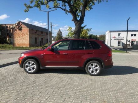 Красный БМВ Х5, объемом двигателя 3 л и пробегом 150 тыс. км за 15500 $, фото 1 на Automoto.ua