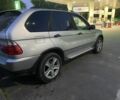 Серый БМВ Х5, объемом двигателя 3 л и пробегом 247 тыс. км за 7800 $, фото 1 на Automoto.ua