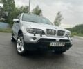 Серый БМВ Х5, объемом двигателя 4.4 л и пробегом 318 тыс. км за 9000 $, фото 1 на Automoto.ua