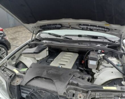 Серый БМВ Х5, объемом двигателя 3 л и пробегом 344 тыс. км за 13700 $, фото 6 на Automoto.ua