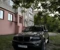 Серый БМВ Х5, объемом двигателя 3 л и пробегом 410 тыс. км за 11500 $, фото 1 на Automoto.ua