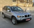 Серый БМВ Х5, объемом двигателя 3 л и пробегом 318 тыс. км за 7004 $, фото 1 на Automoto.ua