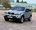 Серый БМВ Х5, объемом двигателя 3 л и пробегом 300 тыс. км за 8505 $, фото 1 на Automoto.ua
