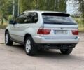Серый БМВ Х5, объемом двигателя 3 л и пробегом 300 тыс. км за 8505 $, фото 2 на Automoto.ua