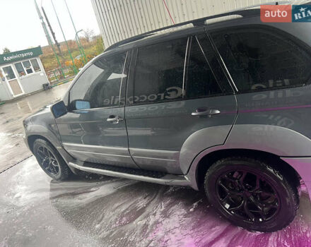 Серый БМВ Х5, объемом двигателя 4.4 л и пробегом 269 тыс. км за 6700 $, фото 4 на Automoto.ua