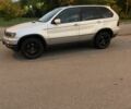 Серый БМВ Х5, объемом двигателя 3 л и пробегом 345 тыс. км за 6100 $, фото 1 на Automoto.ua