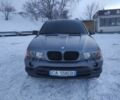 Серый БМВ Х5, объемом двигателя 3 л и пробегом 230 тыс. км за 5900 $, фото 1 на Automoto.ua