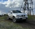 Серый БМВ Х5, объемом двигателя 3 л и пробегом 200 тыс. км за 4600 $, фото 1 на Automoto.ua