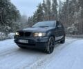Серый БМВ Х5, объемом двигателя 3 л и пробегом 400 тыс. км за 4900 $, фото 1 на Automoto.ua