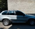 Серый БМВ Х5, объемом двигателя 3 л и пробегом 350 тыс. км за 4500 $, фото 1 на Automoto.ua