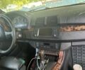 Серый БМВ Х5, объемом двигателя 3 л и пробегом 300 тыс. км за 5800 $, фото 5 на Automoto.ua