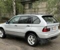 Серый БМВ Х5, объемом двигателя 3 л и пробегом 300 тыс. км за 4300 $, фото 1 на Automoto.ua