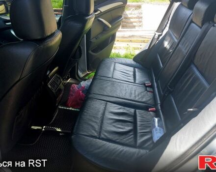 Серый БМВ Х5, объемом двигателя 3 л и пробегом 690 тыс. км за 9000 $, фото 4 на Automoto.ua
