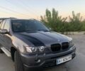 Серый БМВ Х5, объемом двигателя 3 л и пробегом 433 тыс. км за 8699 $, фото 1 на Automoto.ua