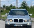 Серый БМВ Х5, объемом двигателя 3 л и пробегом 297 тыс. км за 6800 $, фото 3 на Automoto.ua