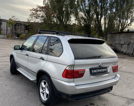 Серый БМВ Х5, объемом двигателя 3 л и пробегом 390 тыс. км за 5500 $, фото 4 на Automoto.ua