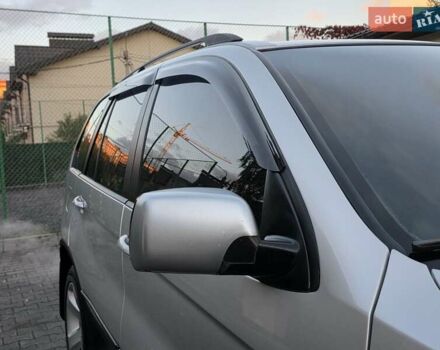 Серый БМВ Х5, объемом двигателя 3 л и пробегом 295 тыс. км за 7999 $, фото 48 на Automoto.ua