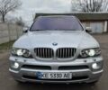 Серый БМВ Х5, объемом двигателя 3 л и пробегом 317 тыс. км за 8700 $, фото 1 на Automoto.ua