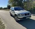 Серый БМВ Х5, объемом двигателя 3 л и пробегом 320 тыс. км за 6300 $, фото 1 на Automoto.ua