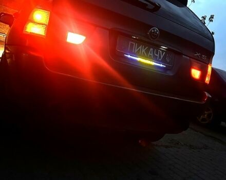 Серый БМВ Х5, объемом двигателя 3 л и пробегом 315 тыс. км за 8350 $, фото 2 на Automoto.ua