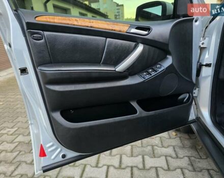 Серый БМВ Х5, объемом двигателя 3 л и пробегом 295 тыс. км за 7999 $, фото 78 на Automoto.ua