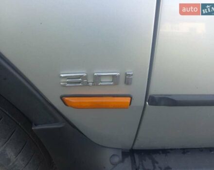 Серый БМВ Х5, объемом двигателя 3 л и пробегом 293 тыс. км за 8600 $, фото 2 на Automoto.ua