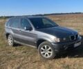 Серый БМВ Х5, объемом двигателя 3 л и пробегом 320 тыс. км за 4500 $, фото 1 на Automoto.ua