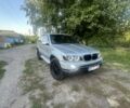 Серый БМВ Х5, объемом двигателя 3 л и пробегом 305 тыс. км за 3499 $, фото 1 на Automoto.ua