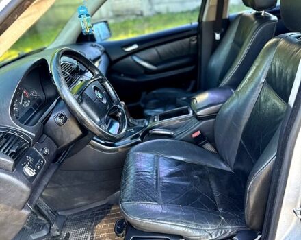 Серый БМВ Х5, объемом двигателя 3 л и пробегом 350 тыс. км за 7000 $, фото 4 на Automoto.ua