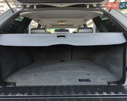 Серый БМВ Х5, объемом двигателя 3 л и пробегом 295 тыс. км за 7999 $, фото 123 на Automoto.ua