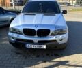 Серый БМВ Х5, объемом двигателя 3 л и пробегом 200 тыс. км за 8000 $, фото 1 на Automoto.ua