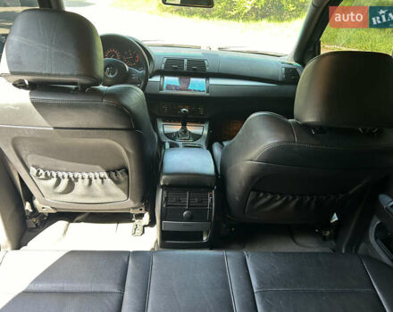 Серый БМВ Х5, объемом двигателя 3 л и пробегом 327 тыс. км за 13000 $, фото 10 на Automoto.ua