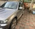 Серый БМВ Х5, объемом двигателя 3 л и пробегом 294 тыс. км за 6000 $, фото 1 на Automoto.ua