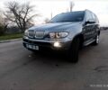 Серый БМВ Х5, объемом двигателя 3 л и пробегом 300 тыс. км за 6000 $, фото 1 на Automoto.ua
