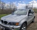Серый БМВ Х5, объемом двигателя 3 л и пробегом 338 тыс. км за 5995 $, фото 1 на Automoto.ua