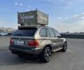 Серый БМВ Х5, объемом двигателя 3 л и пробегом 400 тыс. км за 10500 $, фото 1 на Automoto.ua