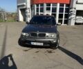 Серый БМВ Х5, объемом двигателя 3 л и пробегом 340 тыс. км за 12000 $, фото 1 на Automoto.ua