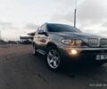 Серый БМВ Х5, объемом двигателя 3 л и пробегом 300 тыс. км за 6000 $, фото 1 на Automoto.ua