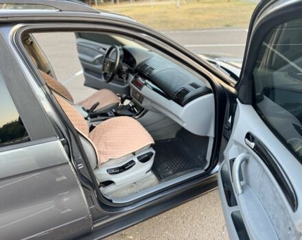 Серый БМВ Х5, объемом двигателя 3 л и пробегом 299 тыс. км за 4199 $, фото 4 на Automoto.ua