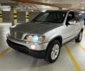 Серый БМВ Х5, объемом двигателя 3 л и пробегом 298 тыс. км за 5200 $, фото 1 на Automoto.ua