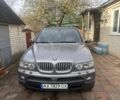 Серый БМВ Х5, объемом двигателя 3 л и пробегом 294 тыс. км за 6000 $, фото 1 на Automoto.ua