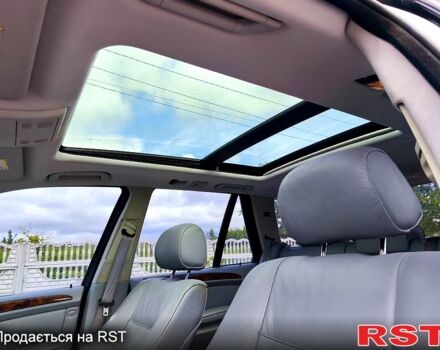 Серый БМВ Х5, объемом двигателя 3 л и пробегом 294 тыс. км за 8450 $, фото 4 на Automoto.ua