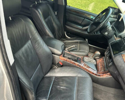Серый БМВ Х5, объемом двигателя 3 л и пробегом 415 тыс. км за 8300 $, фото 4 на Automoto.ua