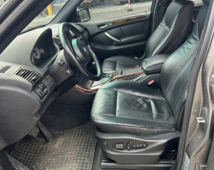 Серый БМВ Х5, объемом двигателя 4.8 л и пробегом 143 тыс. км за 18000 $, фото 8 на Automoto.ua